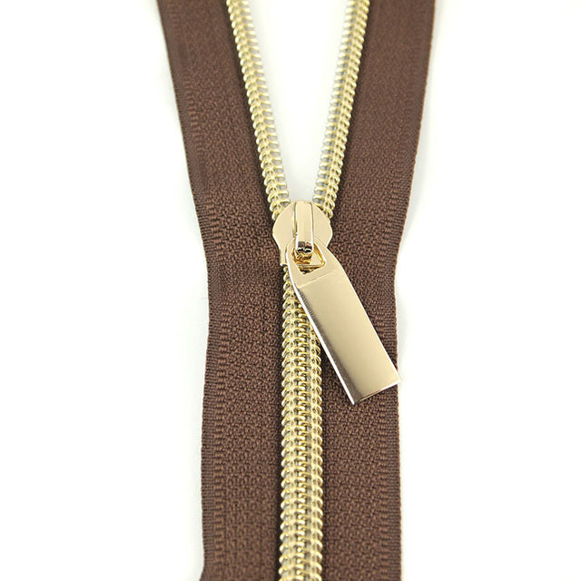 Sallie Tomato #5 Nylon Zippers & Pulls - Brown with Gold Coil Primary Image
